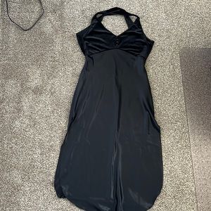 Black satin, tea-length nightgown.